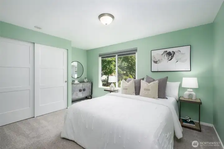 Nice guest bedroom with nook for extra space.