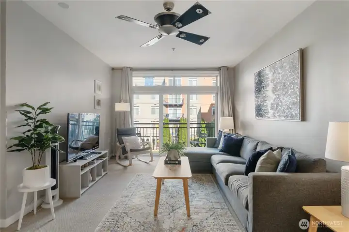 Spacious living room facing the serene courtyard garden