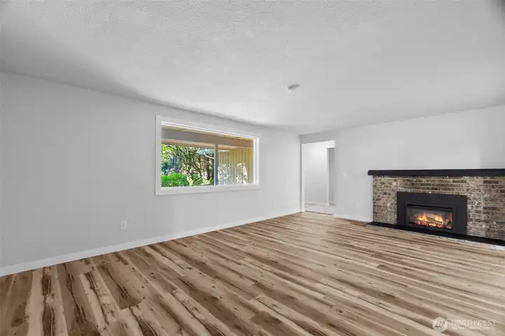 Living room with wood burning fireplace
