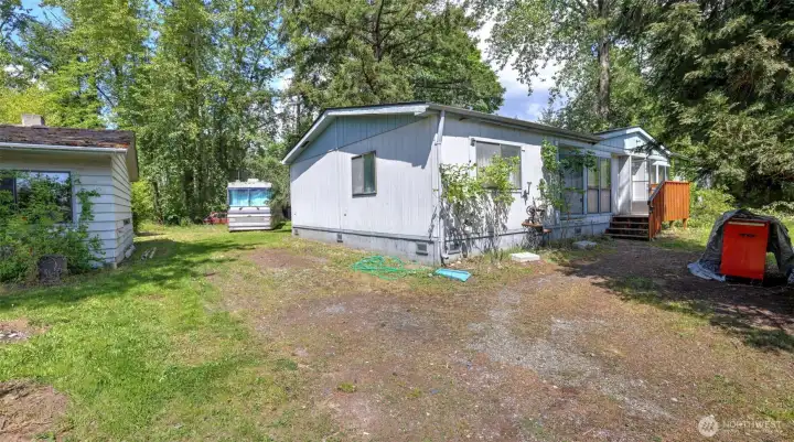 All structures on lot stay but sold with value in the land as-is.