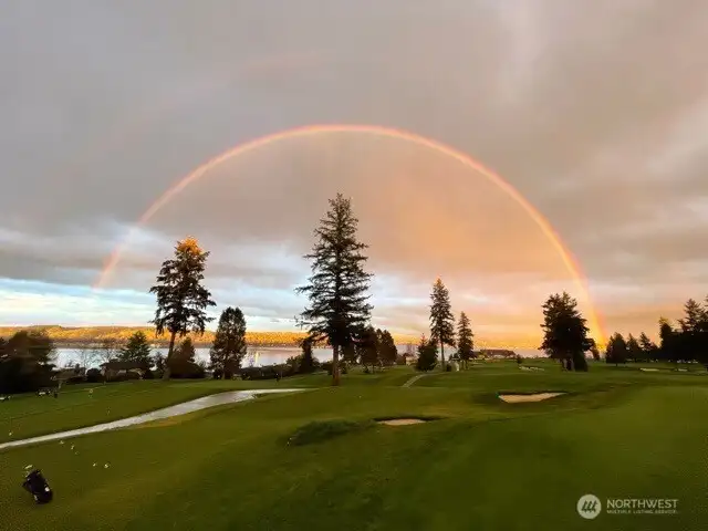 A moment of rare atmosphere on the Sand Point Country Club course, with the fairway opening west toward Lake Washington. Scenes like this capture the quiet, park-like setting surrounding the Fairway Residence and Bungalow, where daily life is framed by light, weather and long open vistas across the 4th Green.