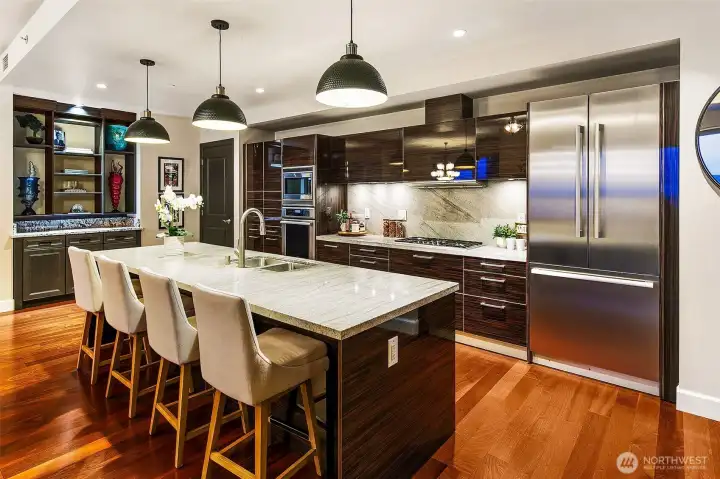 chefs kitchen with gas cooking and premier applaince