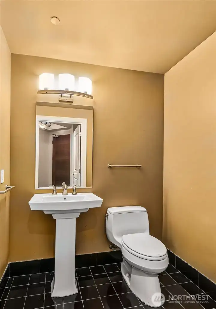 powder room and coat closet upon entry