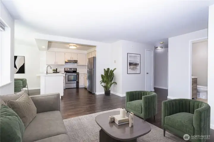 Open-concept living and dining area with clean lines and plenty of natural light.