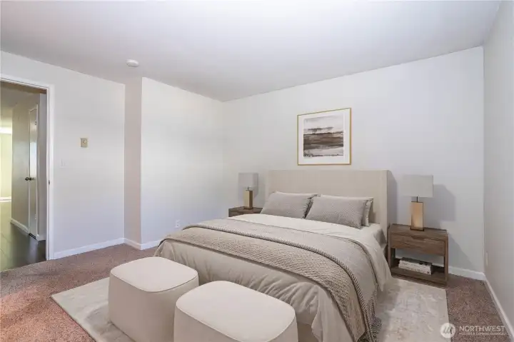 Primary bedroom with clean finishes and flexible layout.