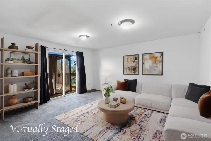 Lower level rec room with new carpet & slider to the lower deck area with gazebo.