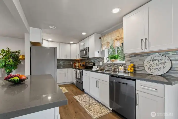 Plenty of counter and cabinet space is this updated kitchen.