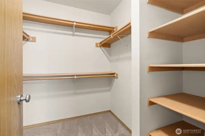 Large walk-in closet in primary bedroom.