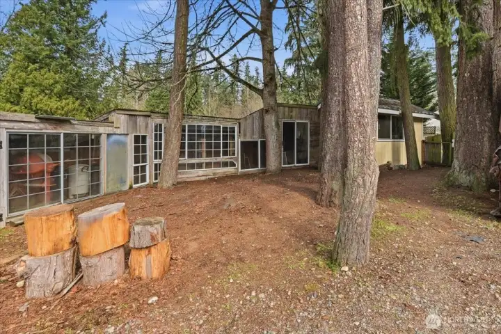 Custom built sheds for storing stuff or hobby or play rooms.