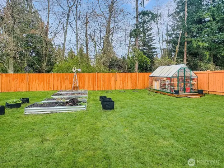 This fully fenced private back yard is a gardeners dream.