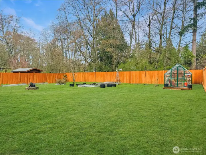 This fully fenced private back yard is a gardeners dream.