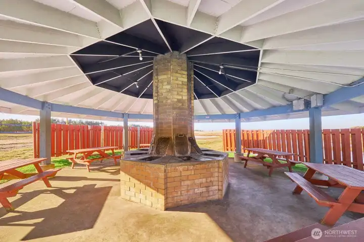 Community BBQ space designed for relaxed  entertaining with minimal cleanup.