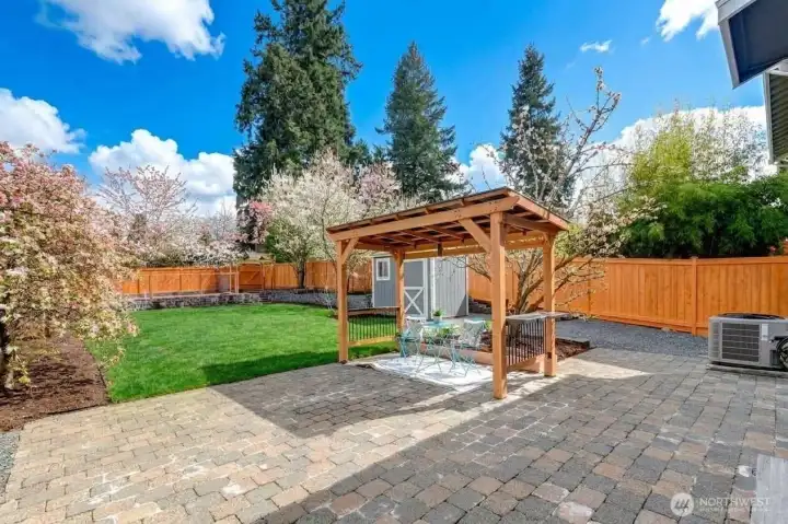 Over-sized paver stone patio w/ Gazebo for outdoor kitchen + freshly stained fencing. Over-sized paver stone patio w/ Gazebo for outdoor kitchen + freshly stained fencing.