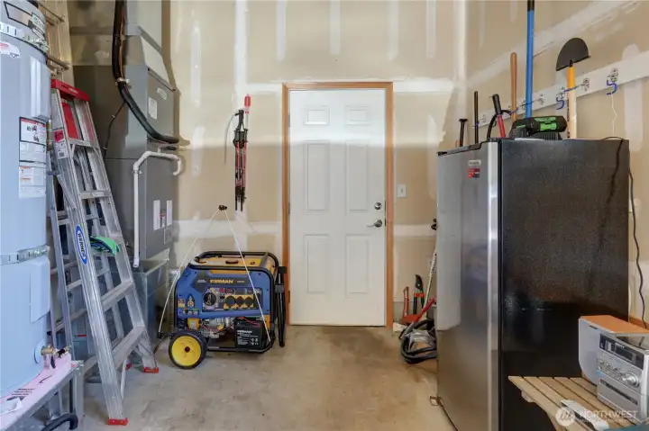 Garage refrigerator stays. generator priced at $500.