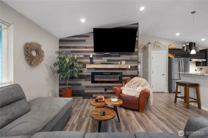 Open great room connecting easily to the kitchen and dining areas for comfortable everyday living.