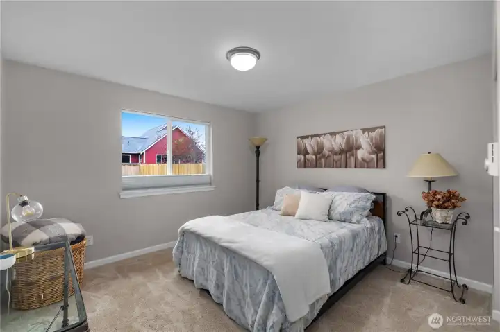 BR 2. Settle into a comfortable secondary bedroom with soft neutral finishes and natural light.