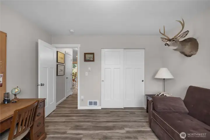 BR 3. Enjoy another view of the secondary bedroom with closet storage and easy access to the main living areas.