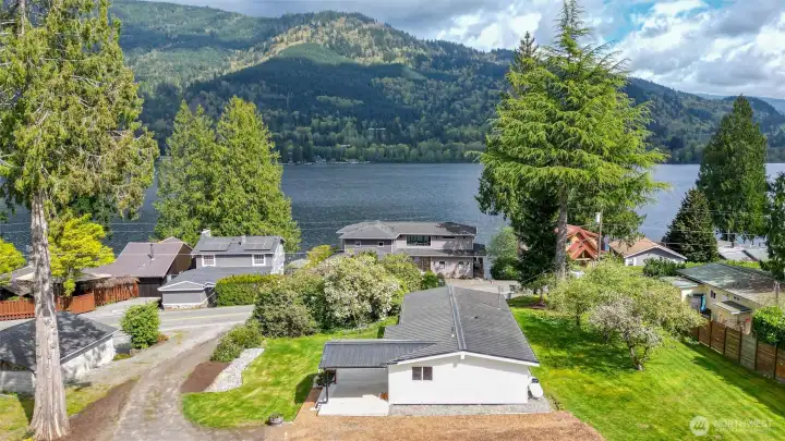 The upper portion of the property is large enough to accommodate a second dwelling which has potential lake views.