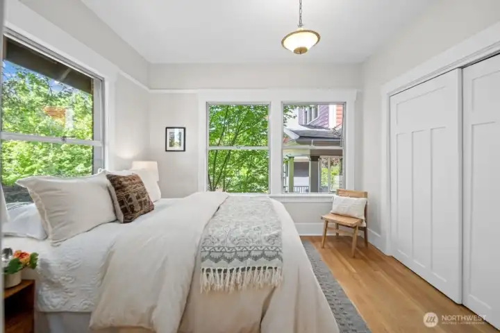 This bedroom is located in the NW corner of the spacious apartment.