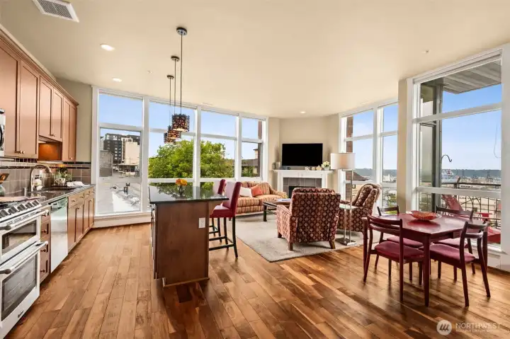 Walls of windows surround this amazing corner suite at The Roberson, in the heart of downtown Tacoma's theater district.