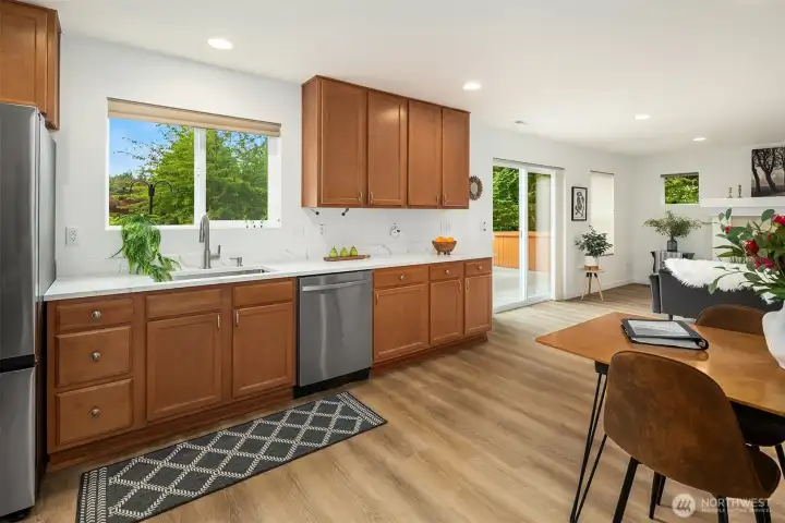 Great cabinets, New Sink, Countertops, appliances, and Flooring