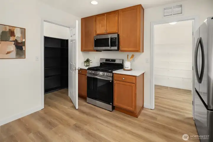 Kitchen/Walk in Pantry on Left/ Storage and Utility room on right