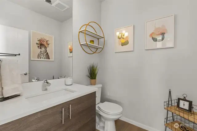 Main level features a powder room.