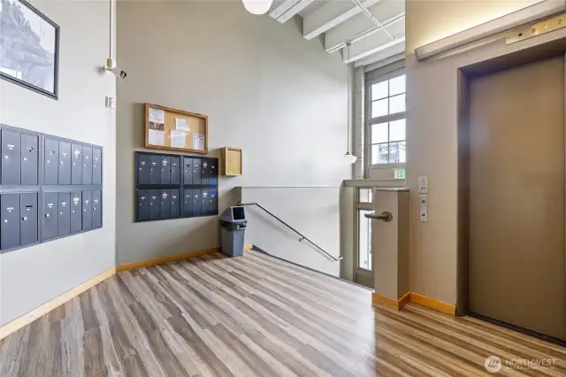 Secure Cliff St. entrance with mailbox and elevator