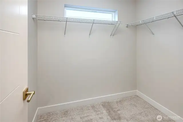 Large walk-in closet in primary bedroom