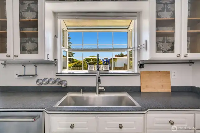 Enjoy looking into the backyard through your garden window.