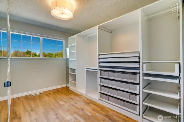 2nd bedroom was converted to walk-in closet with wonderful storage drawers and organizers. Could also be a great craft room/sewing room.