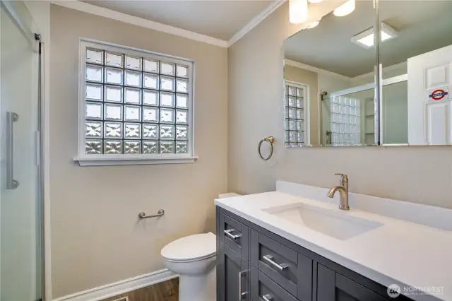 Main bath was remodeled with nice sized walk in shower and updated vanity.