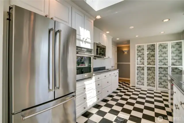 Kitchenaid appliances, electric stove top and wall oven.