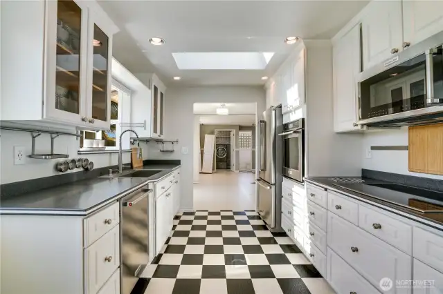 Light and bright kitchen faces the backyard and is adjoining to the family room.