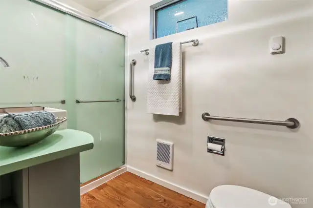 Sweet bathroom with a perfect sized shower.