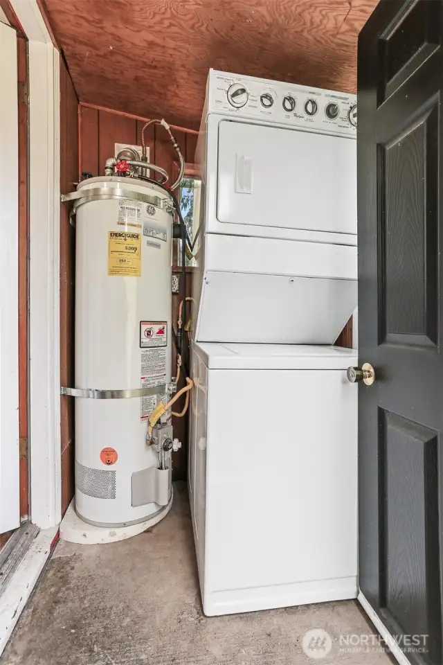 The back porch with a full size washer/dryer.