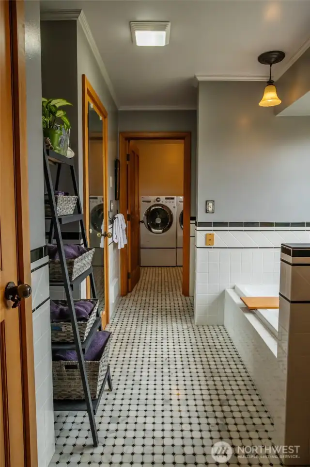 Main house floor 2 3/4 bathroom looking toward laundry room