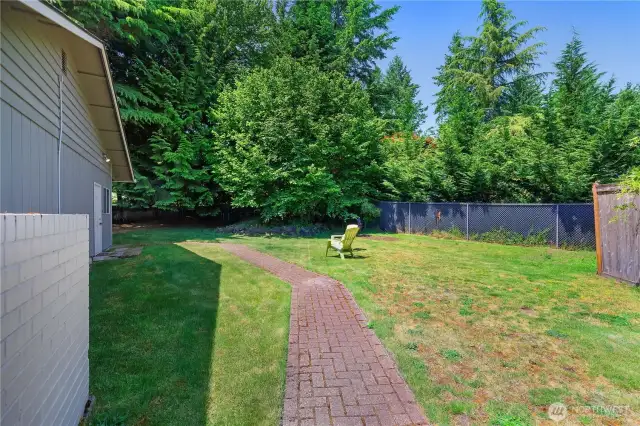 Side yard, path to the office.