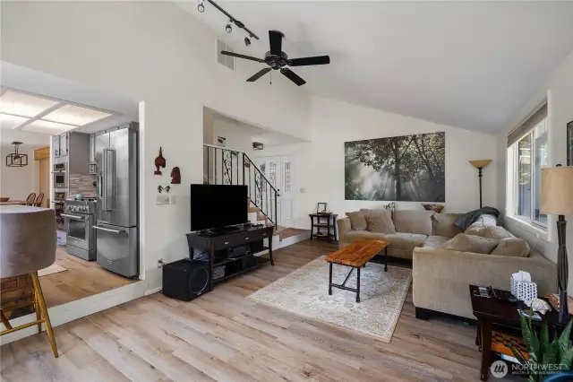 Newer flooring and ceiling fan.