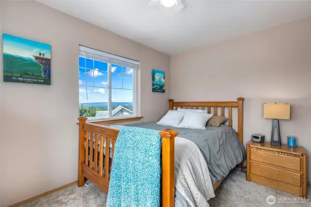 Bedroom 3 with view of the bay and Olympics.