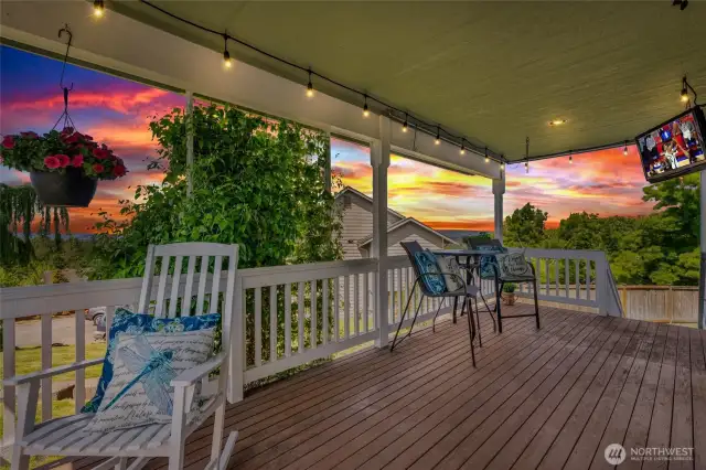Private side porch with a view of the bay and Olympic mountains.