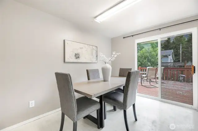 Dining space off kitchen w/ access to deck.