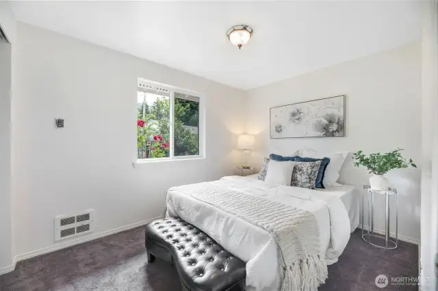Additional bedrooms on opposite side of living room.