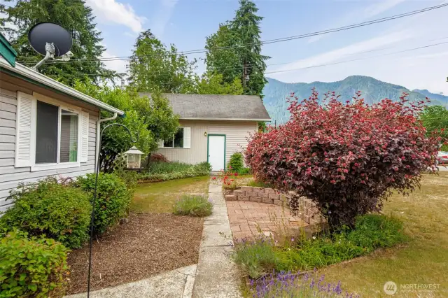 Front walkway to detached shop.