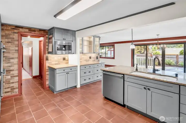 Walk-in pantry area with lots of shelving