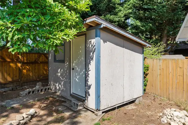 Close-up of the functional backyard shed—ideal for hobbies, storage, or a workshop setup.
