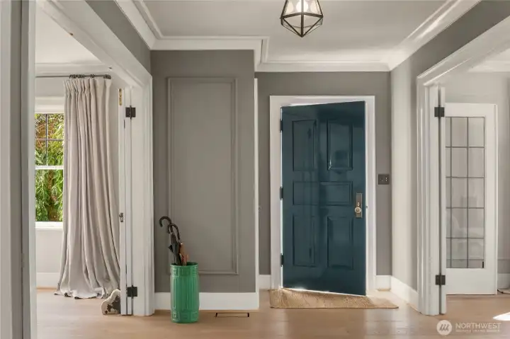 Step inside the front door to a gracious entry that prepares the way for the home’s refined character. Definitive millwork, historically accurate leaded glass doors, and the handsome front door color create an inviting first impression that blends timeless design with modern updates.