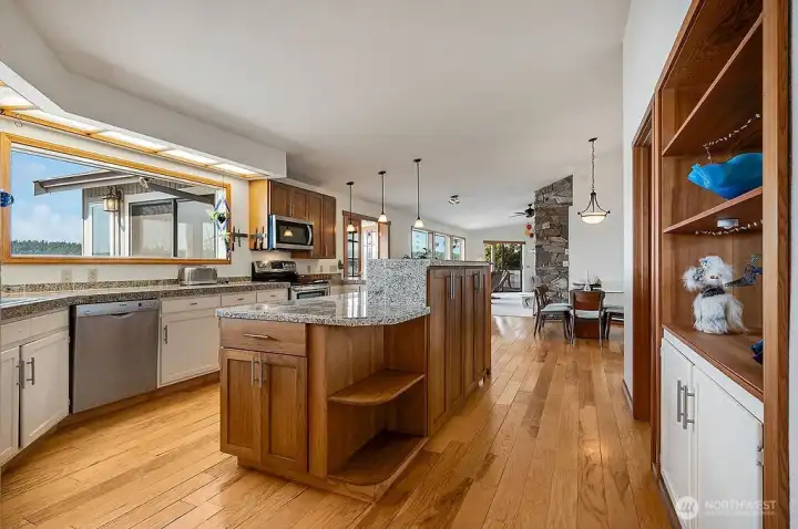 Well designed kitchen with ample counter space and modern appliances.