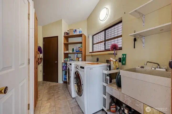 Laundry area with lots of storage.