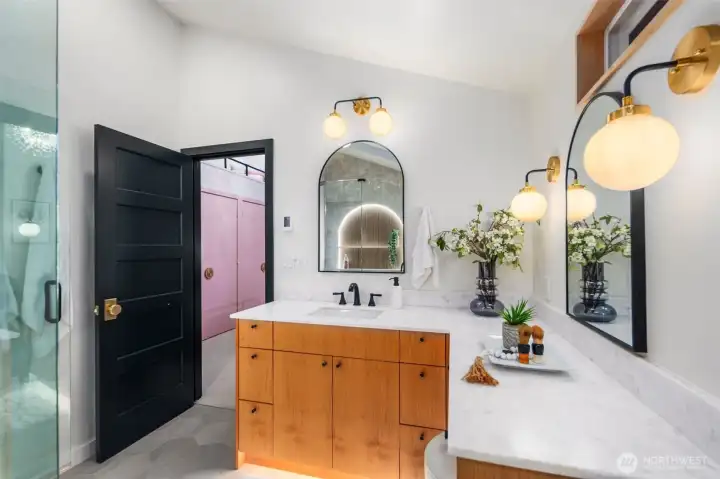 Custom alder vanity, makeup counter, & toe kick lighting.